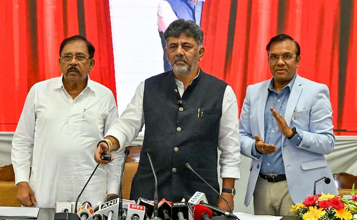 Government office files and certificate forms in a Karnataka administrative setting