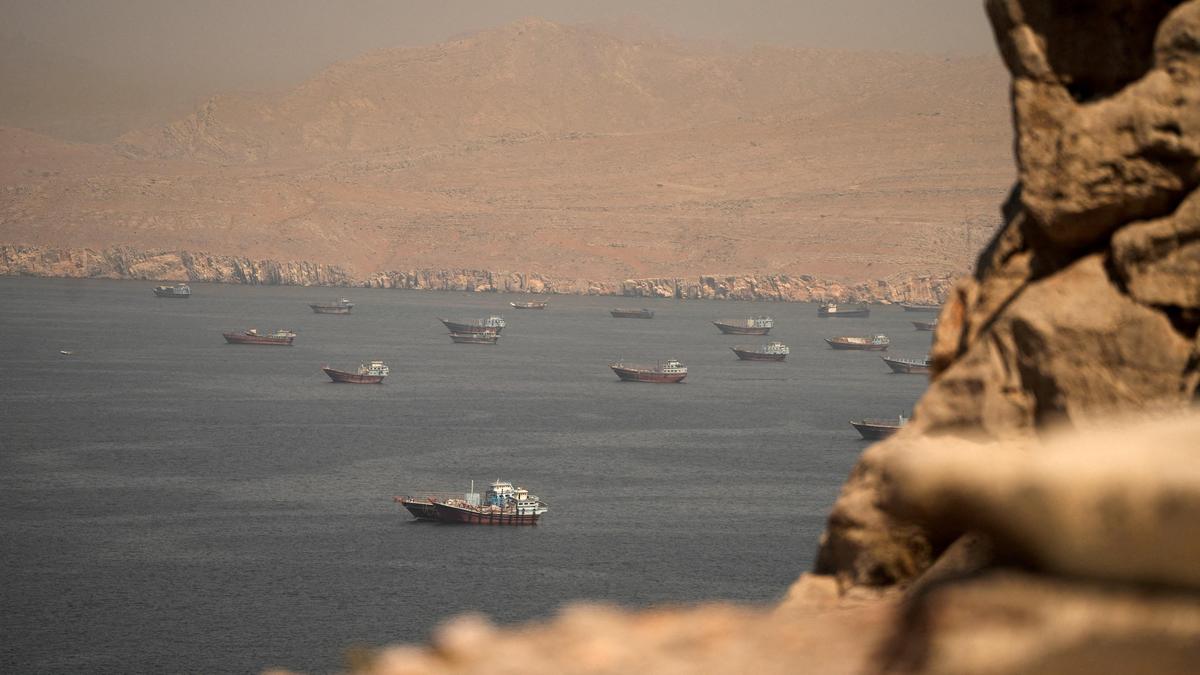 Destruction in Tehran and a threatened shipping corridor during a United States-Iran escalation