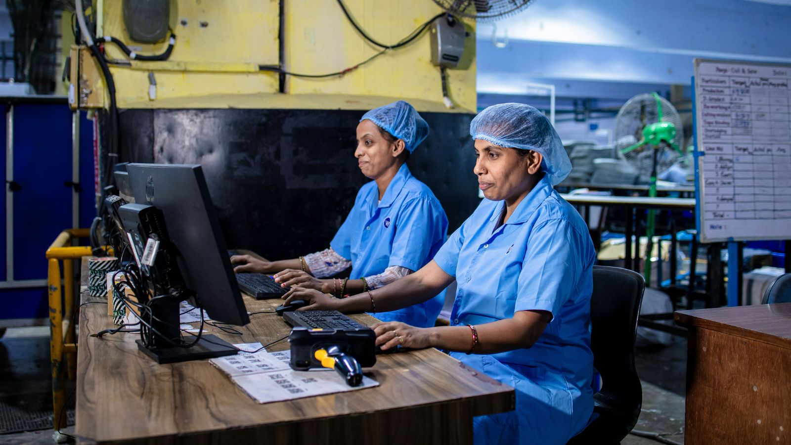 Illustration of electronics assembly lines and factory equipment in an industrial unit in Tamil Nadu